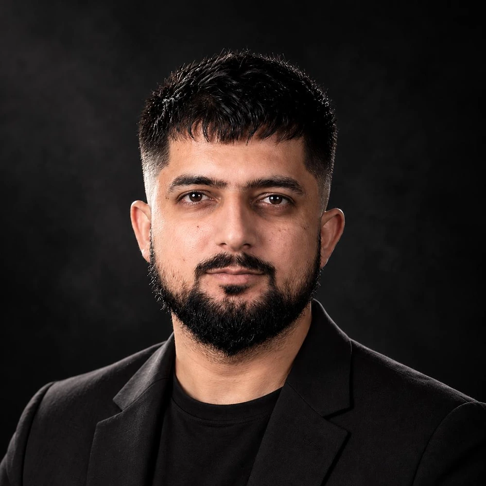 Awais Hameed in a black blazer, the designer behind Premium LinkedIn DFY Designs